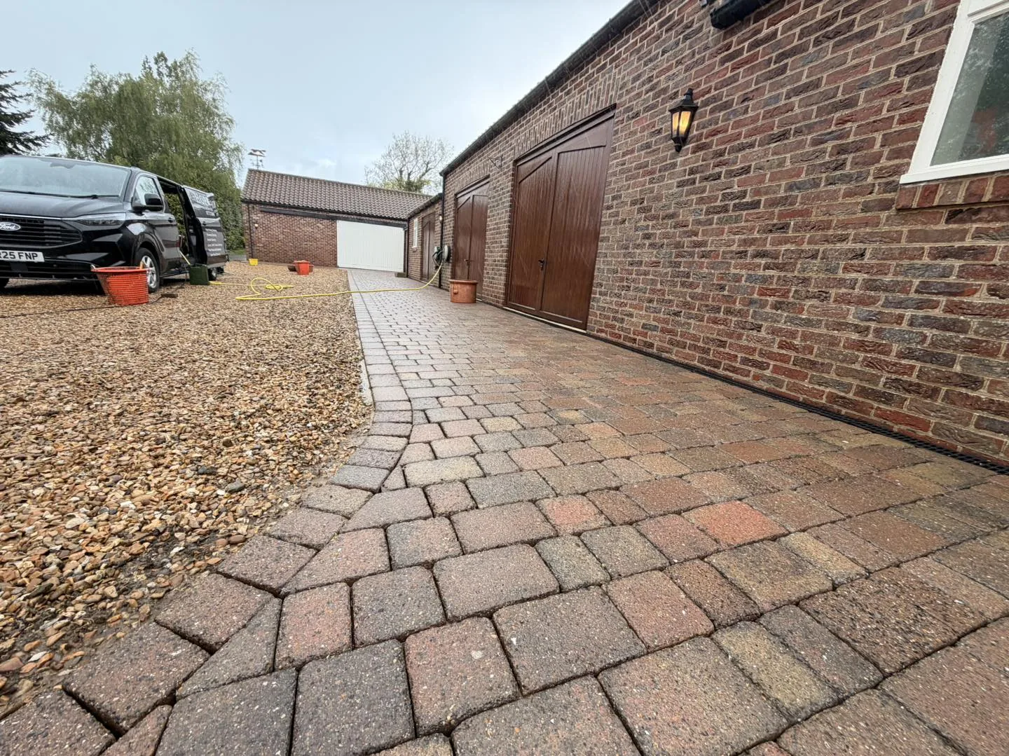 Block paving side driveway clean after cleaning by Hopkins Exterior Cleaning