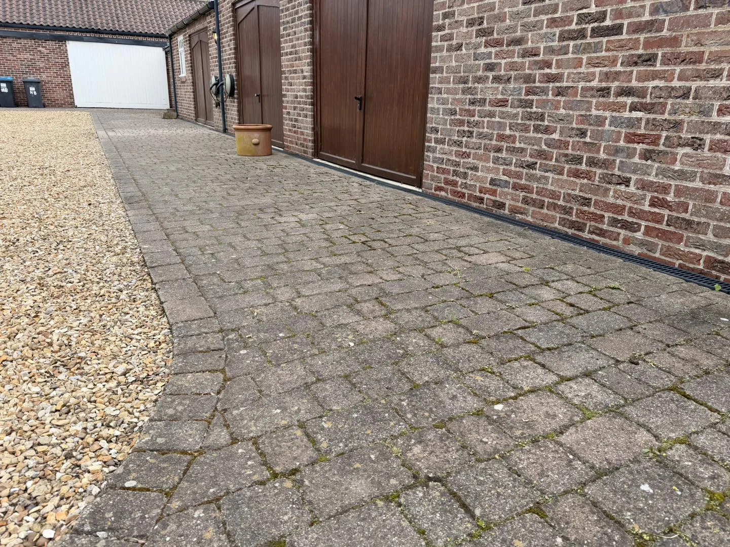 Block paving side driveway clean before cleaning by Hopkins Exterior Cleaning
