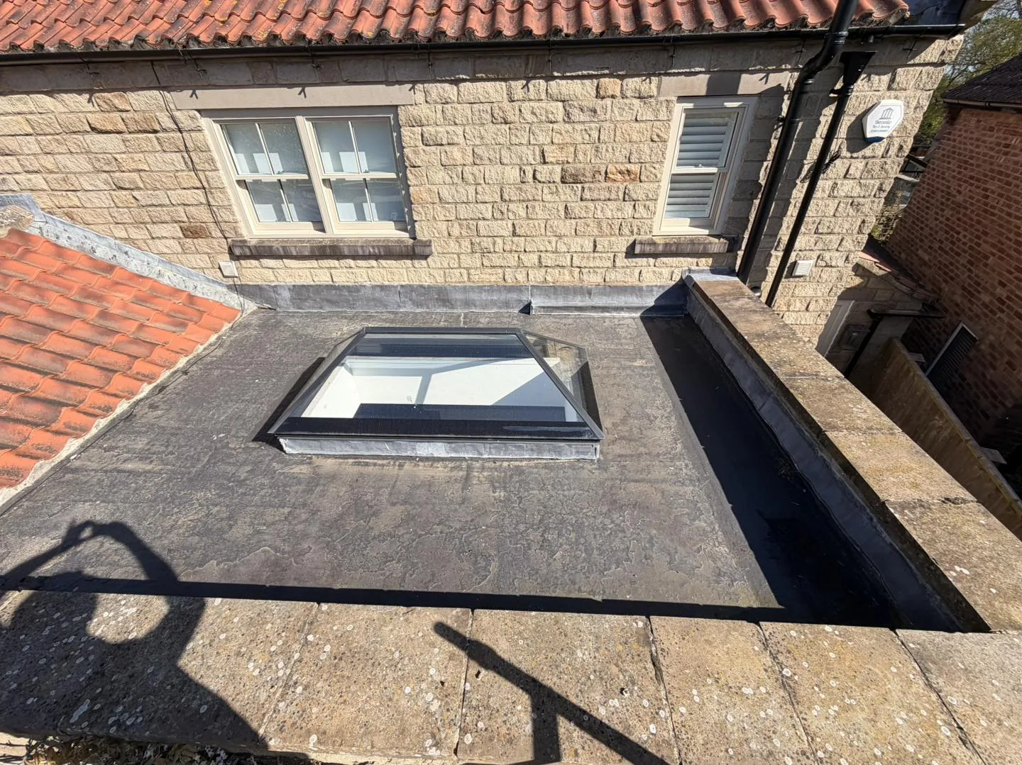 Flat roof surface clean after cleaning by Hopkins Exterior Cleaning
