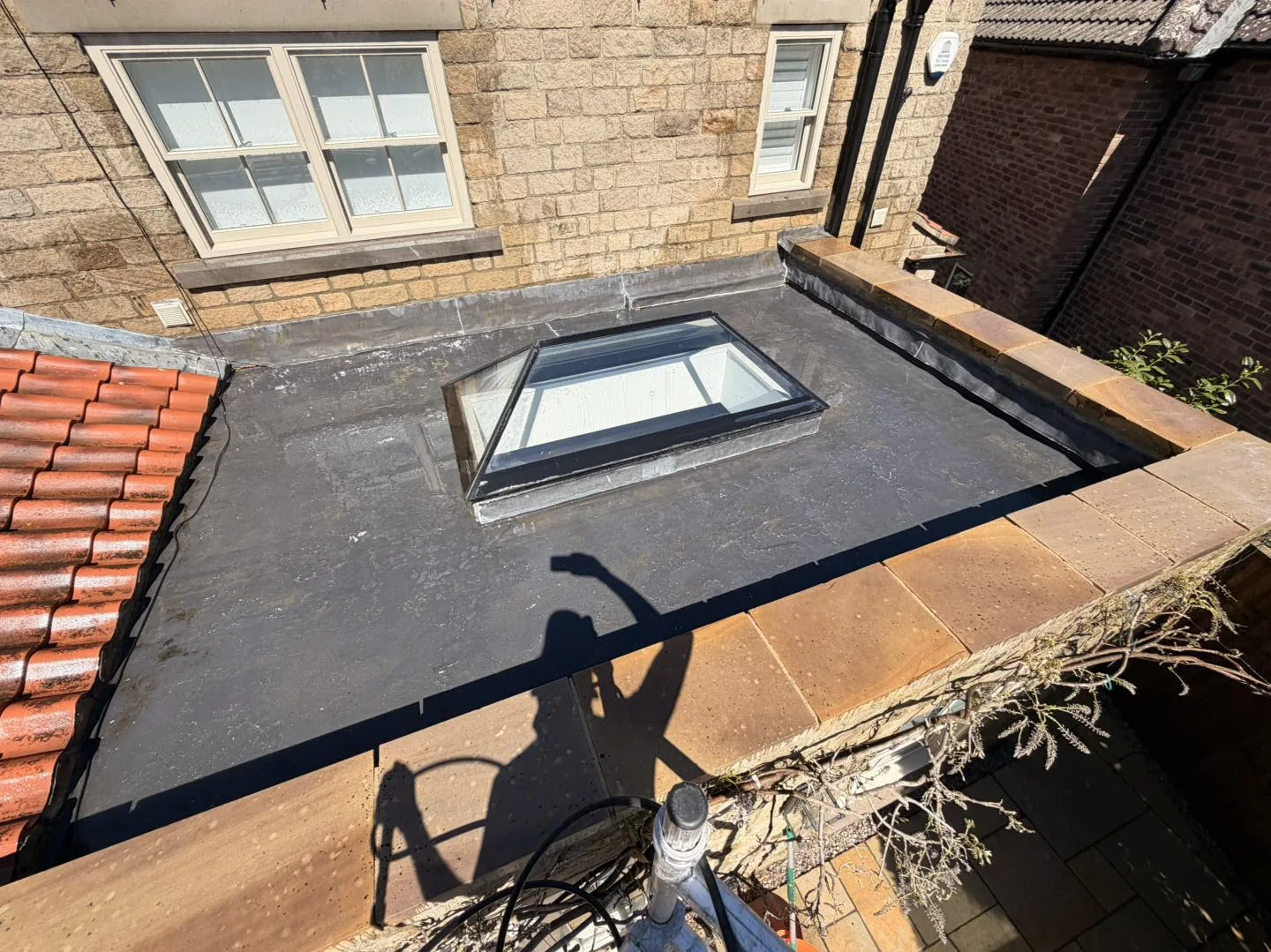 Flat roof surface clean before cleaning by Hopkins Exterior Cleaning