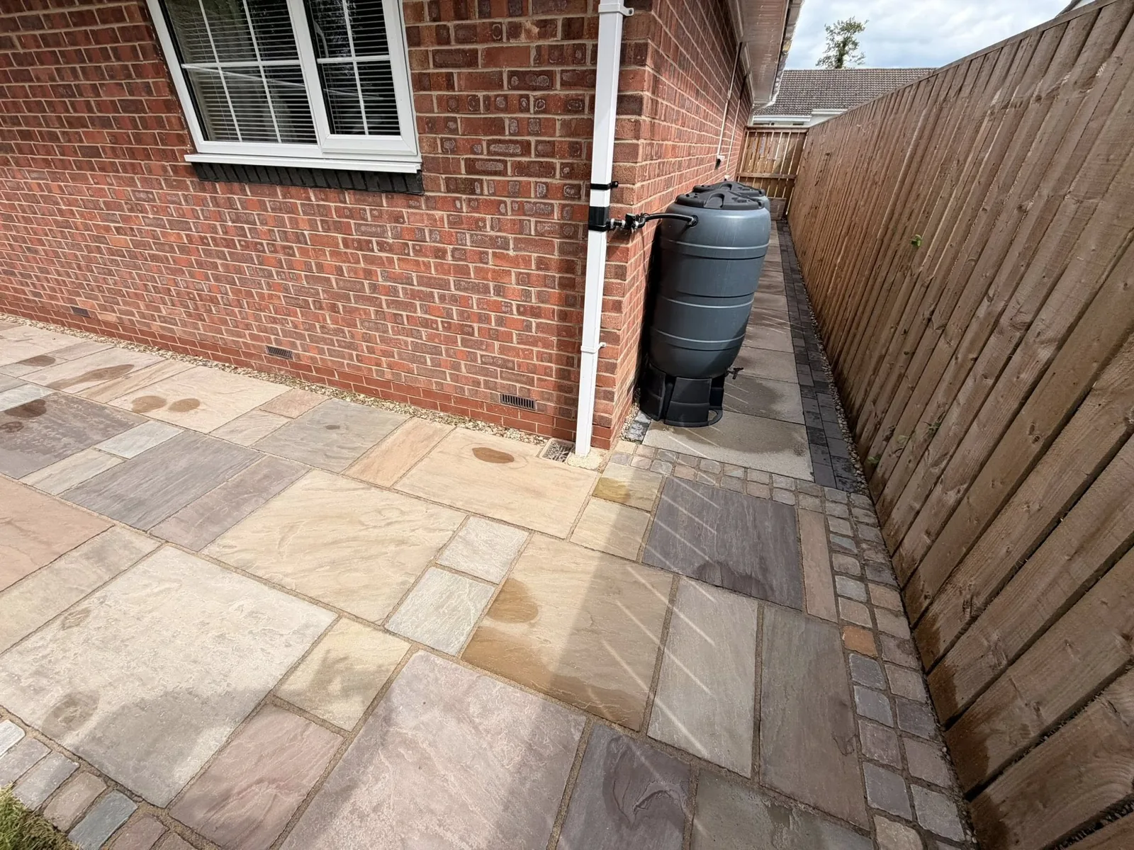House side path clean after cleaning by Hopkins Exterior Cleaning