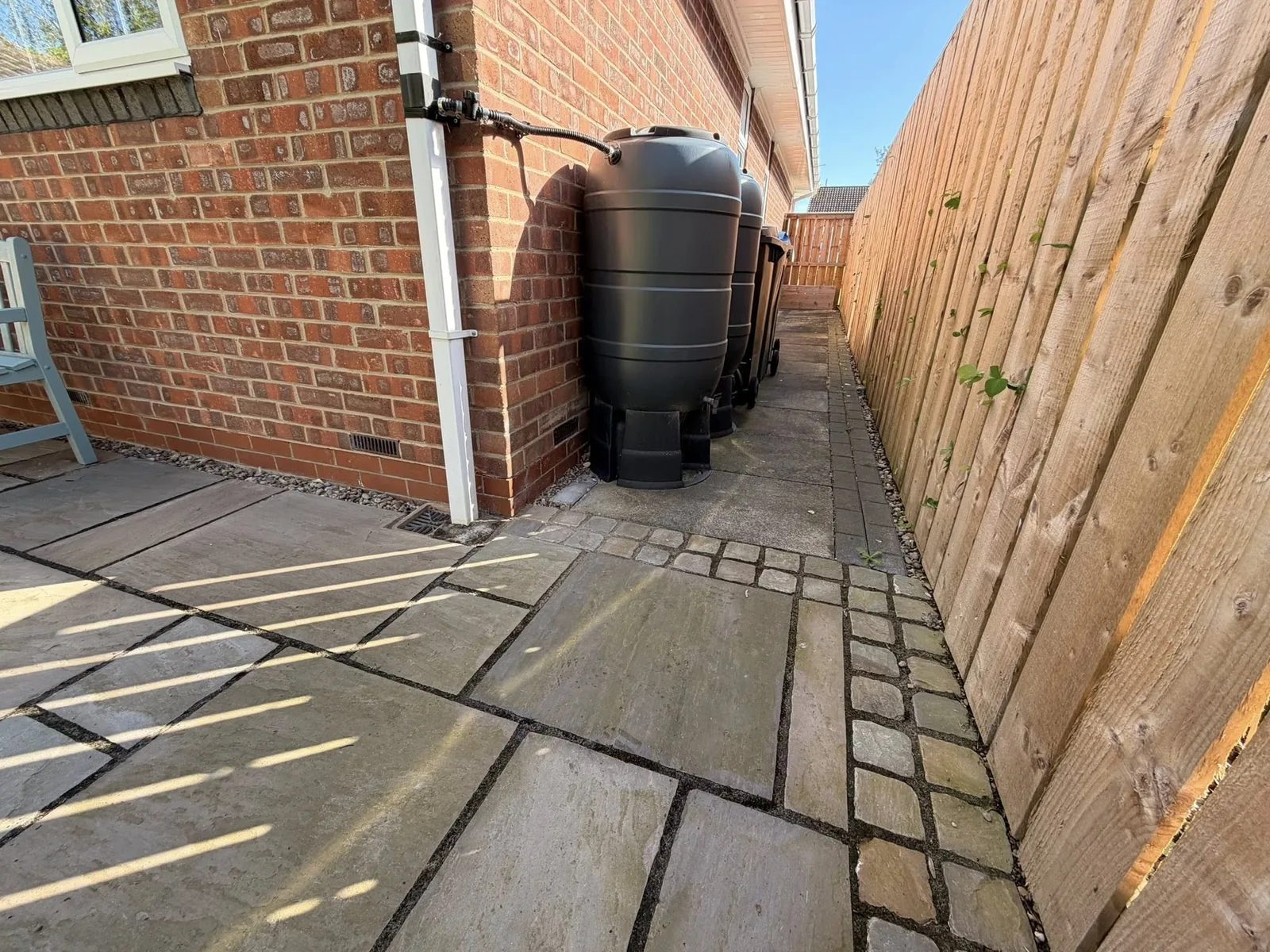 House side path clean before cleaning by Hopkins Exterior Cleaning