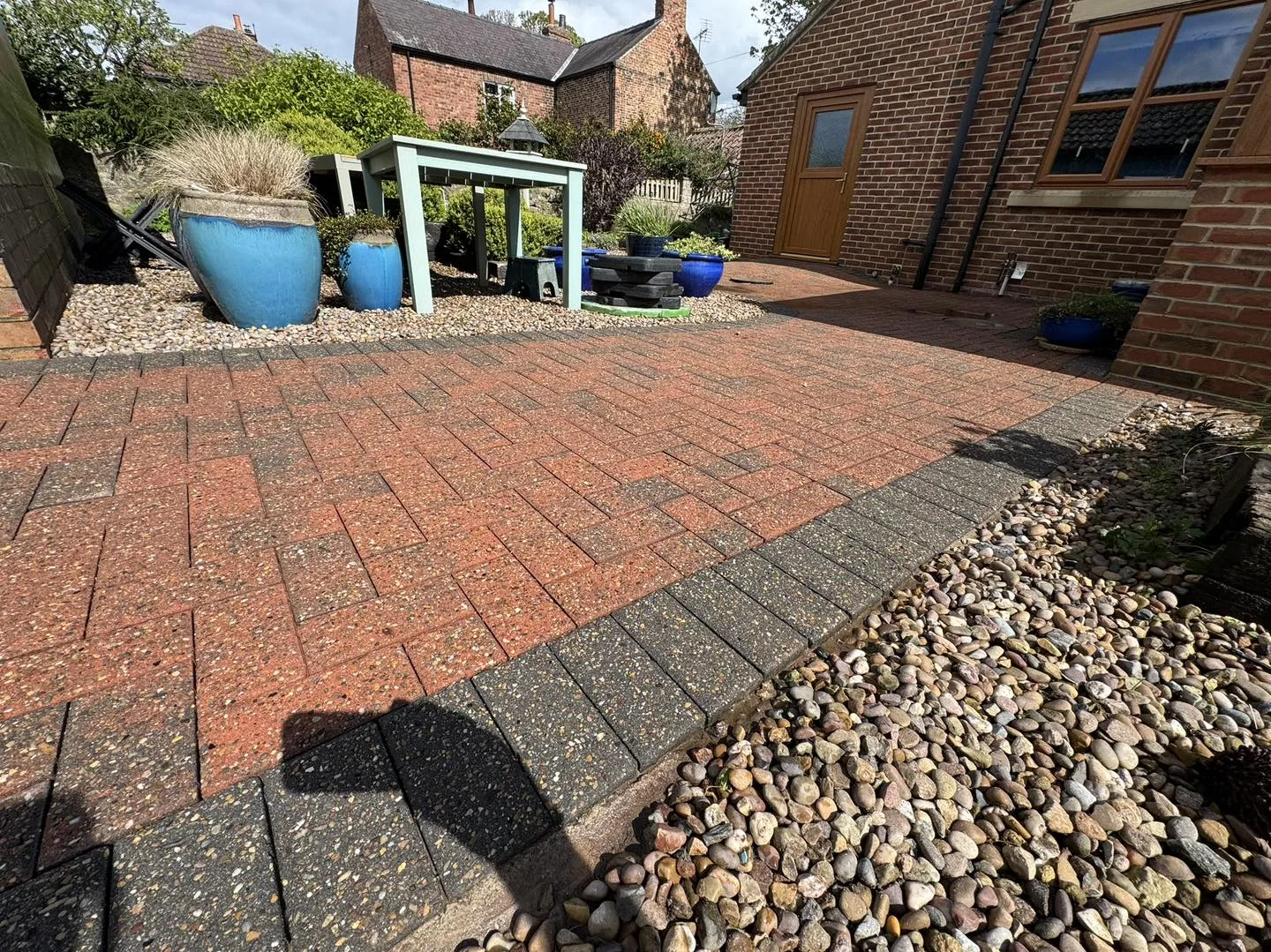 Brick patio clean after cleaning by Hopkins Exterior Cleaning