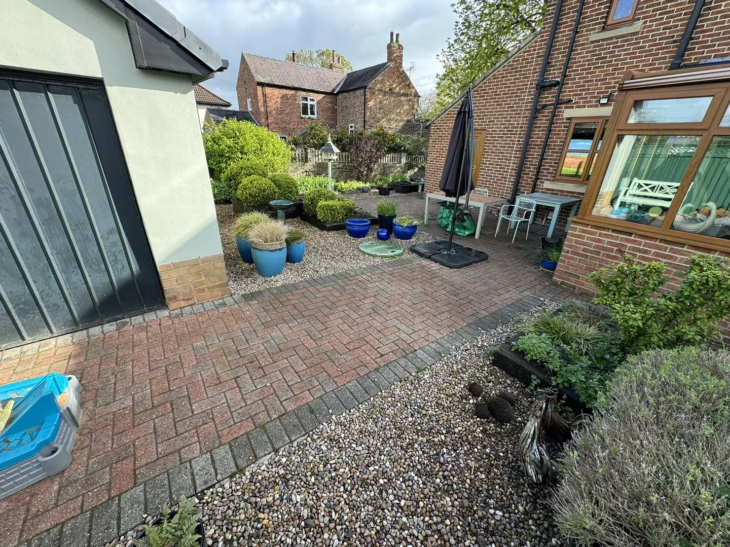 Brick patio clean before cleaning by Hopkins Exterior Cleaning